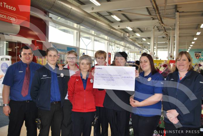 ILMINSTER NEWS: Tesco store coins in the cash for charities in 12 months