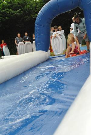 Ilminster Town FC fun day Part 1 – July 9, 2016: A giant water slide was the star attraction at a family fun day held to celebrate Ilminster Town Football Club’s new Archie Gooch Pavilion headquarters in Britten’s Field. Photo 11