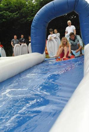 Ilminster Town FC fun day Part 1 – July 9, 2016: A giant water slide was the star attraction at a family fun day held to celebrate Ilminster Town Football Club’s new Archie Gooch Pavilion headquarters in Britten’s Field. Photo 12