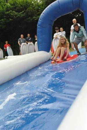 Ilminster Town FC fun day Part 1 – July 9, 2016: A giant water slide was the star attraction at a family fun day held to celebrate Ilminster Town Football Club’s new Archie Gooch Pavilion headquarters in Britten’s Field. Photo 13