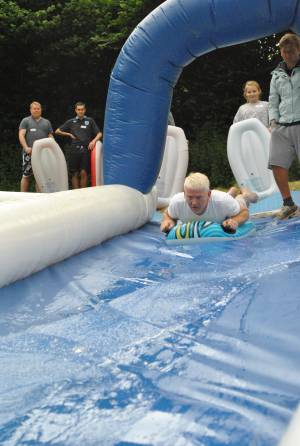 Ilminster Town FC fun day Part 1 – July 9, 2016: A giant water slide was the star attraction at a family fun day held to celebrate Ilminster Town Football Club’s new Archie Gooch Pavilion headquarters in Britten’s Field. Photo 21