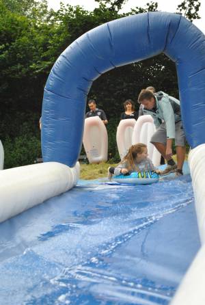 Ilminster Town FC fun day Part 1 – July 9, 2016: A giant water slide was the star attraction at a family fun day held to celebrate Ilminster Town Football Club’s new Archie Gooch Pavilion headquarters in Britten’s Field. Photo 23