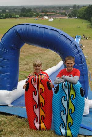 Ilminster Town FC fun day Part 1 – July 9, 2016: A giant water slide was the star attraction at a family fun day held to celebrate Ilminster Town Football Club’s new Archie Gooch Pavilion headquarters in Britten’s Field. Photo 2