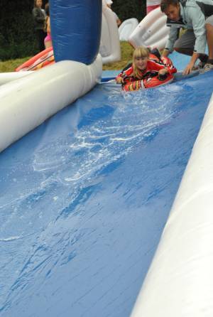 Ilminster Town FC fun day Part 1 – July 9, 2016: A giant water slide was the star attraction at a family fun day held to celebrate Ilminster Town Football Club’s new Archie Gooch Pavilion headquarters in Britten’s Field. Photo 6