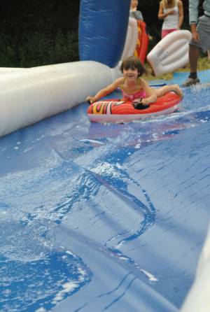 Ilminster Town FC fun day Part 1 – July 9, 2016: A giant water slide was the star attraction at a family fun day held to celebrate Ilminster Town Football Club’s new Archie Gooch Pavilion headquarters in Britten’s Field. Photo 9