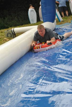 Ilminster Town FC fun day Part 2 – July 9, 2016: A giant water slide was the star attraction at a family fun day held to celebrate Ilminster Town Football Club’s new Archie Gooch Pavilion headquarters in Britten’s Field. Photo 10