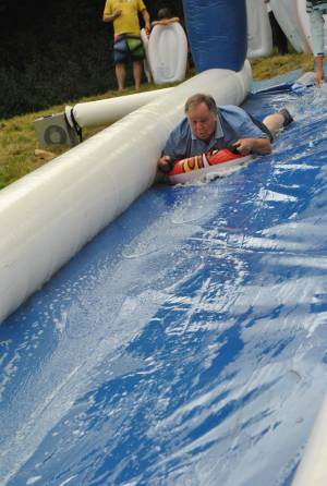 Ilminster Town FC fun day Part 2 – July 9, 2016: A giant water slide was the star attraction at a family fun day held to celebrate Ilminster Town Football Club’s new Archie Gooch Pavilion headquarters in Britten’s Field. Photo 20