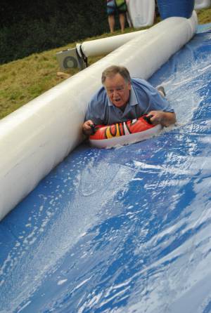 Ilminster Town FC fun day Part 2 – July 9, 2016: A giant water slide was the star attraction at a family fun day held to celebrate Ilminster Town Football Club’s new Archie Gooch Pavilion headquarters in Britten’s Field. Photo 21
