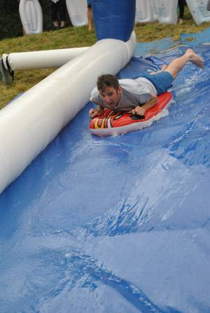 Ilminster Town FC fun day Part 2 – July 9, 2016: A giant water slide was the star attraction at a family fun day held to celebrate Ilminster Town Football Club’s new Archie Gooch Pavilion headquarters in Britten’s Field. Photo 24