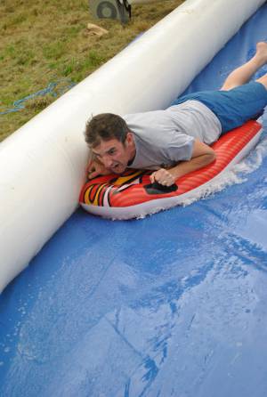 Ilminster Town FC fun day Part 2 – July 9, 2016: A giant water slide was the star attraction at a family fun day held to celebrate Ilminster Town Football Club’s new Archie Gooch Pavilion headquarters in Britten’s Field. Photo 25