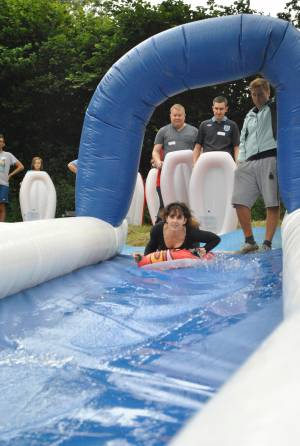 Ilminster Town FC fun day Part 2 – July 9, 2016: A giant water slide was the star attraction at a family fun day held to celebrate Ilminster Town Football Club’s new Archie Gooch Pavilion headquarters in Britten’s Field. Photo 2