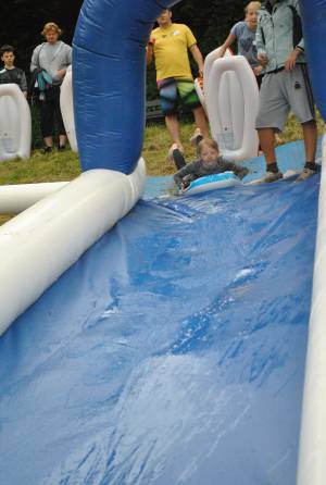 Ilminster Town FC fun day Part 2 – July 9, 2016: A giant water slide was the star attraction at a family fun day held to celebrate Ilminster Town Football Club’s new Archie Gooch Pavilion headquarters in Britten’s Field. Photo 29