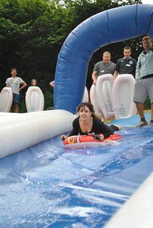 Ilminster Town FC fun day Part 2 – July 9, 2016: A giant water slide was the star attraction at a family fun day held to celebrate Ilminster Town Football Club’s new Archie Gooch Pavilion headquarters in Britten’s Field. Photo 3