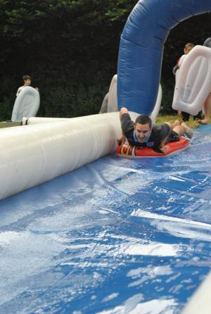 Ilminster Town FC fun day Part 2 – July 9, 2016: A giant water slide was the star attraction at a family fun day held to celebrate Ilminster Town Football Club’s new Archie Gooch Pavilion headquarters in Britten’s Field. Photo 5