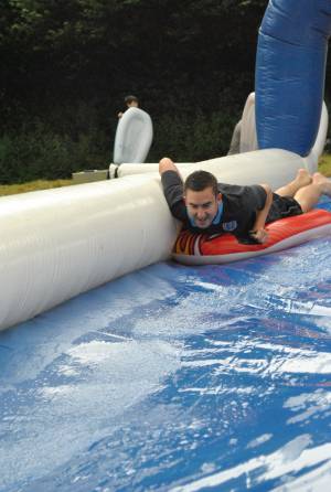 Ilminster Town FC fun day Part 2 – July 9, 2016: A giant water slide was the star attraction at a family fun day held to celebrate Ilminster Town Football Club’s new Archie Gooch Pavilion headquarters in Britten’s Field. Photo 6