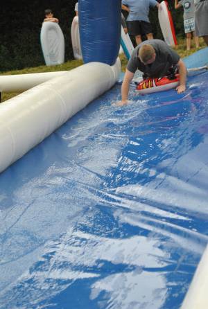 Ilminster Town FC fun day Part 2 – July 9, 2016: A giant water slide was the star attraction at a family fun day held to celebrate Ilminster Town Football Club’s new Archie Gooch Pavilion headquarters in Britten’s Field. Photo 8
