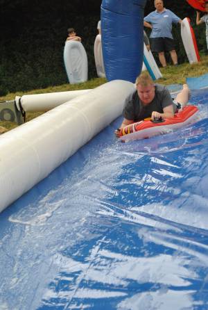 Ilminster Town FC fun day Part 2 – July 9, 2016: A giant water slide was the star attraction at a family fun day held to celebrate Ilminster Town Football Club’s new Archie Gooch Pavilion headquarters in Britten’s Field. Photo 9