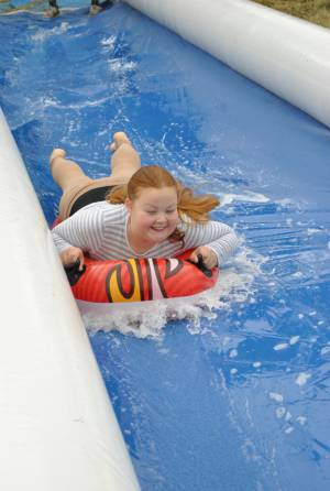 Ilminster Town FC fun day Part 3 – July 9, 2016: A giant water slide was the star attraction at a family fun day held to celebrate Ilminster Town Football Club’s new Archie Gooch Pavilion headquarters in Britten’s Field. Photo 10