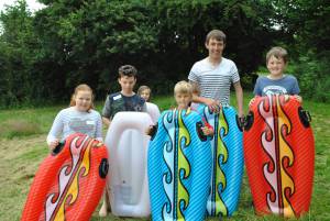 Ilminster Town FC fun day Part 3 – July 9, 2016: A giant water slide was the star attraction at a family fun day held to celebrate Ilminster Town Football Club’s new Archie Gooch Pavilion headquarters in Britten’s Field. Photo 4