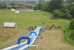 Ilminster Town FC fun day Part 3 – July 9, 2016: A giant water slide was the star attraction at a family fun day held to celebrate Ilminster Town Football Club’s new Archie Gooch Pavilion headquarters in Britten’s Field. Photo 7