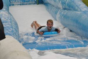 Ilminster Town FC fun day Part 4 – July 9, 2016: A giant water slide was the star attraction at a family fun day held to celebrate Ilminster Town Football Club’s new Archie Gooch Pavilion headquarters in Britten’s Field. Photo 10
