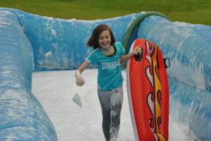 Ilminster Town FC fun day Part 4 – July 9, 2016: A giant water slide was the star attraction at a family fun day held to celebrate Ilminster Town Football Club’s new Archie Gooch Pavilion headquarters in Britten’s Field. Photo 17