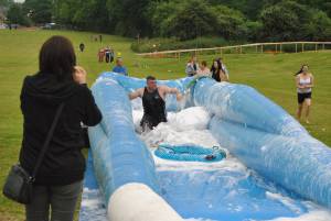 Ilminster Town FC fun day Part 4 – July 9, 2016: A giant water slide was the star attraction at a family fun day held to celebrate Ilminster Town Football Club’s new Archie Gooch Pavilion headquarters in Britten’s Field. Photo 1