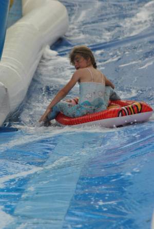 Ilminster Town FC fun day Part 4 – July 9, 2016: A giant water slide was the star attraction at a family fun day held to celebrate Ilminster Town Football Club’s new Archie Gooch Pavilion headquarters in Britten’s Field. Photo 18