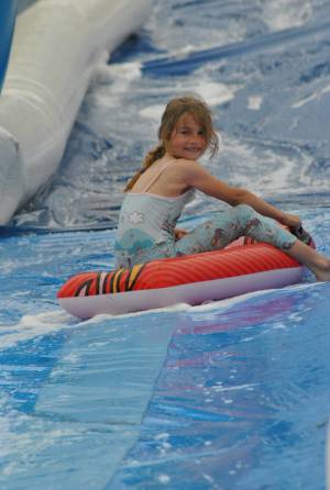 Ilminster Town FC fun day Part 4 – July 9, 2016: A giant water slide was the star attraction at a family fun day held to celebrate Ilminster Town Football Club’s new Archie Gooch Pavilion headquarters in Britten’s Field. Photo 19