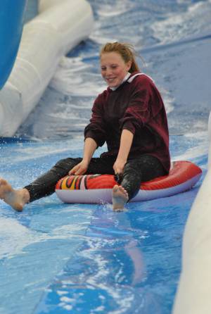 Ilminster Town FC fun day Part 4 – July 9, 2016: A giant water slide was the star attraction at a family fun day held to celebrate Ilminster Town Football Club’s new Archie Gooch Pavilion headquarters in Britten’s Field. Photo 28