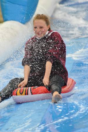 Ilminster Town FC fun day Part 4 – July 9, 2016: A giant water slide was the star attraction at a family fun day held to celebrate Ilminster Town Football Club’s new Archie Gooch Pavilion headquarters in Britten’s Field. Photo 29