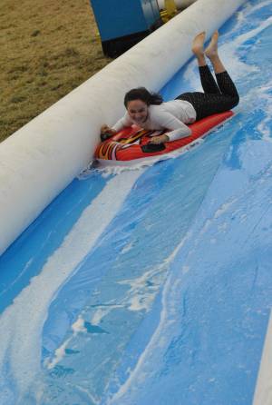 Ilminster Town FC fun day Part 4 – July 9, 2016: A giant water slide was the star attraction at a family fun day held to celebrate Ilminster Town Football Club’s new Archie Gooch Pavilion headquarters in Britten’s Field. Photo 4