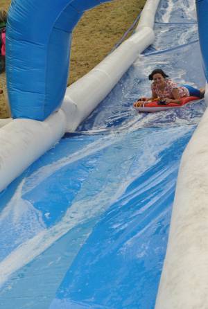 Ilminster Town FC fun day Part 4 – July 9, 2016: A giant water slide was the star attraction at a family fun day held to celebrate Ilminster Town Football Club’s new Archie Gooch Pavilion headquarters in Britten’s Field. Photo 5