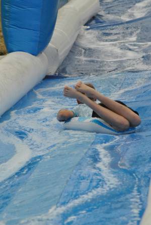 Ilminster Town FC fun day Part 4 – July 9, 2016: A giant water slide was the star attraction at a family fun day held to celebrate Ilminster Town Football Club’s new Archie Gooch Pavilion headquarters in Britten’s Field. Photo 8