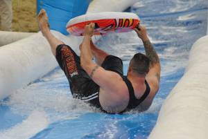 Ilminster Town FC fun day Part 5 – July 9, 2016: A giant water slide was the star attraction at a family fun day held to celebrate Ilminster Town Football Club’s new Archie Gooch Pavilion headquarters in Britten’s Field. Photo 17