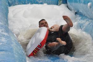 Ilminster Town FC fun day Part 5 – July 9, 2016: A giant water slide was the star attraction at a family fun day held to celebrate Ilminster Town Football Club’s new Archie Gooch Pavilion headquarters in Britten’s Field. Photo 20