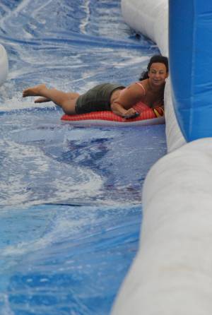 Ilminster Town FC fun day Part 5 – July 9, 2016: A giant water slide was the star attraction at a family fun day held to celebrate Ilminster Town Football Club’s new Archie Gooch Pavilion headquarters in Britten’s Field. Photo 23