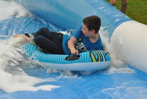 Ilminster Town FC fun day Part 5 – July 9, 2016: A giant water slide was the star attraction at a family fun day held to celebrate Ilminster Town Football Club’s new Archie Gooch Pavilion headquarters in Britten’s Field. Photo 6