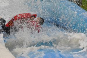 Ilminster Town FC fun day Part 6 – July 9, 2016: A giant water slide was the star attraction at a family fun day held to celebrate Ilminster Town Football Club’s new Archie Gooch Pavilion headquarters in Britten’s Field. Photo 1