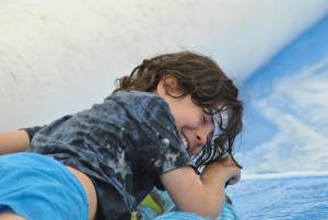 Ilminster Town FC fun day Part 6 – July 9, 2016: A giant water slide was the star attraction at a family fun day held to celebrate Ilminster Town Football Club’s new Archie Gooch Pavilion headquarters in Britten’s Field. Photo 18