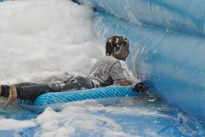Ilminster Town FC fun day Part 6 – July 9, 2016: A giant water slide was the star attraction at a family fun day held to celebrate Ilminster Town Football Club’s new Archie Gooch Pavilion headquarters in Britten’s Field. Photo 27