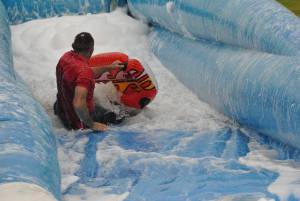 Ilminster Town FC fun day Part 6 – July 9, 2016: A giant water slide was the star attraction at a family fun day held to celebrate Ilminster Town Football Club’s new Archie Gooch Pavilion headquarters in Britten’s Field. Photo 2