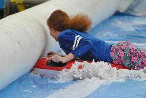 Ilminster Town FC fun day Part 6 – July 9, 2016: A giant water slide was the star attraction at a family fun day held to celebrate Ilminster Town Football Club’s new Archie Gooch Pavilion headquarters in Britten’s Field. Photo 29