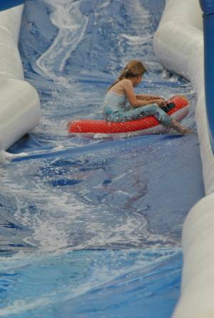 Ilminster Town FC fun day Part 6 – July 9, 2016: A giant water slide was the star attraction at a family fun day held to celebrate Ilminster Town Football Club’s new Archie Gooch Pavilion headquarters in Britten’s Field. Photo 8