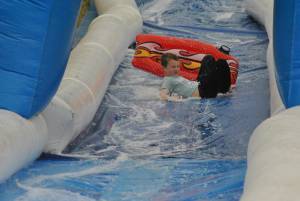 Ilminster Town FC fun day Part 7 – July 9, 2016: A giant water slide was the star attraction at a family fun day held to celebrate Ilminster Town Football Club’s new Archie Gooch Pavilion headquarters in Britten’s Field. Photo 23