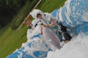Ilminster Town FC fun day Part 8 – July 9, 2016: A giant water slide was the star attraction at a family fun day held to celebrate Ilminster Town Football Club’s new Archie Gooch Pavilion headquarters in Britten’s Field. Photo 11
