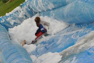 Ilminster Town FC fun day Part 8 – July 9, 2016: A giant water slide was the star attraction at a family fun day held to celebrate Ilminster Town Football Club’s new Archie Gooch Pavilion headquarters in Britten’s Field. Photo 15