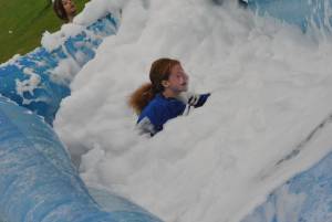 Ilminster Town FC fun day Part 8 – July 9, 2016: A giant water slide was the star attraction at a family fun day held to celebrate Ilminster Town Football Club’s new Archie Gooch Pavilion headquarters in Britten’s Field. Photo 17