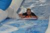 Ilminster Town FC fun day Part 8 – July 9, 2016: A giant water slide was the star attraction at a family fun day held to celebrate Ilminster Town Football Club’s new Archie Gooch Pavilion headquarters in Britten’s Field. Photo 1