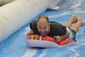 Ilminster Town FC fun day Part 8 – July 9, 2016: A giant water slide was the star attraction at a family fun day held to celebrate Ilminster Town Football Club’s new Archie Gooch Pavilion headquarters in Britten’s Field. Photo 20